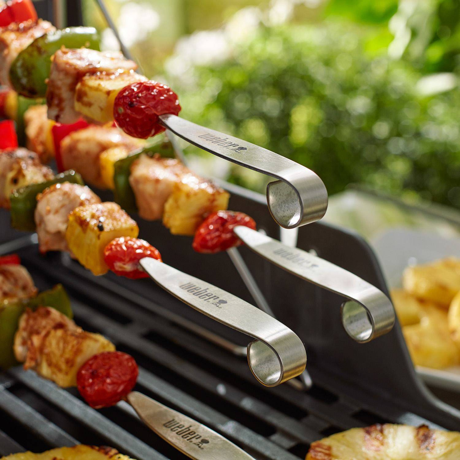 Set 4 spiedini per cottura multilivello su barbecue Weber Set 4 spiedini per cottura multilivello su barbecue Weber